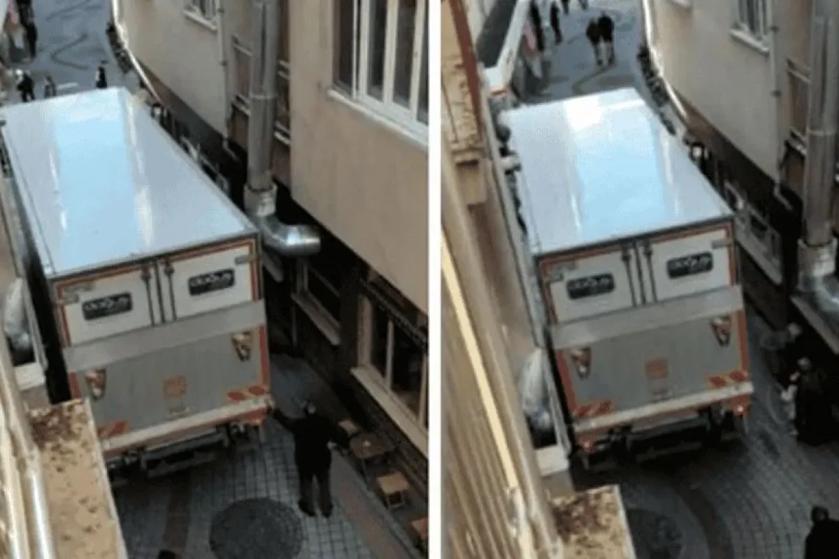 Dar sokağa giren kamyon sıkıştı kaldı