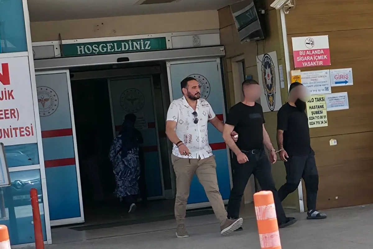 İnegöl'de kol kola cezaevine gönderildiler