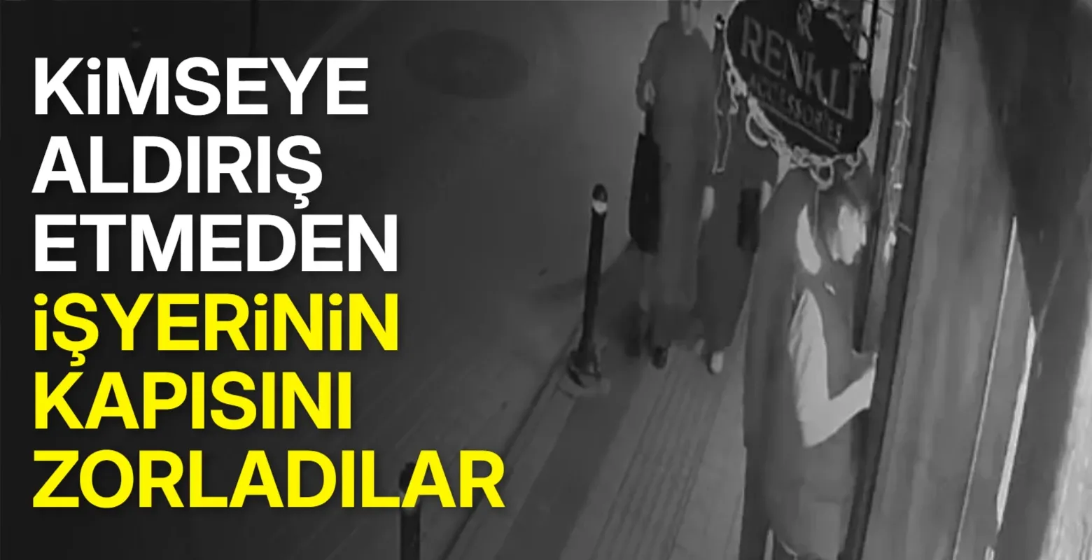 Çevredeki vatandaşlara aldırış etmeden iş yerinin kapısını zorladılar