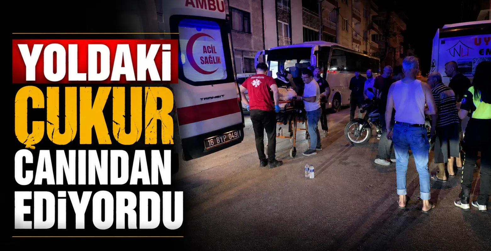 Yoldaki çukur canından ediyordu, otobüsün altına girdi