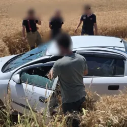 İnegöl'de tarlaya savrulan otomobilde can pazarı!